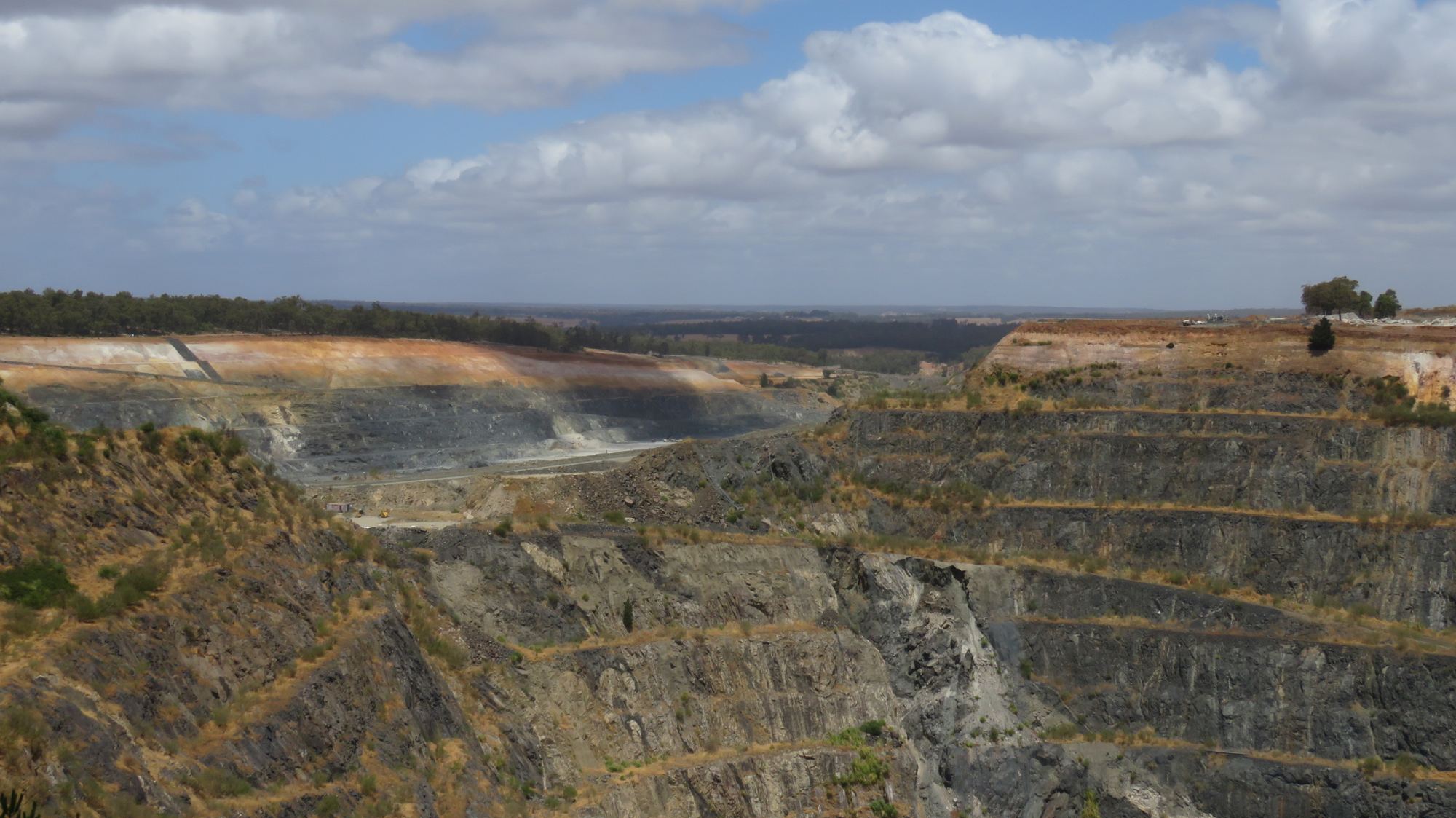 Terraced open pit of the Greenbushes lithium mine, Western Australia